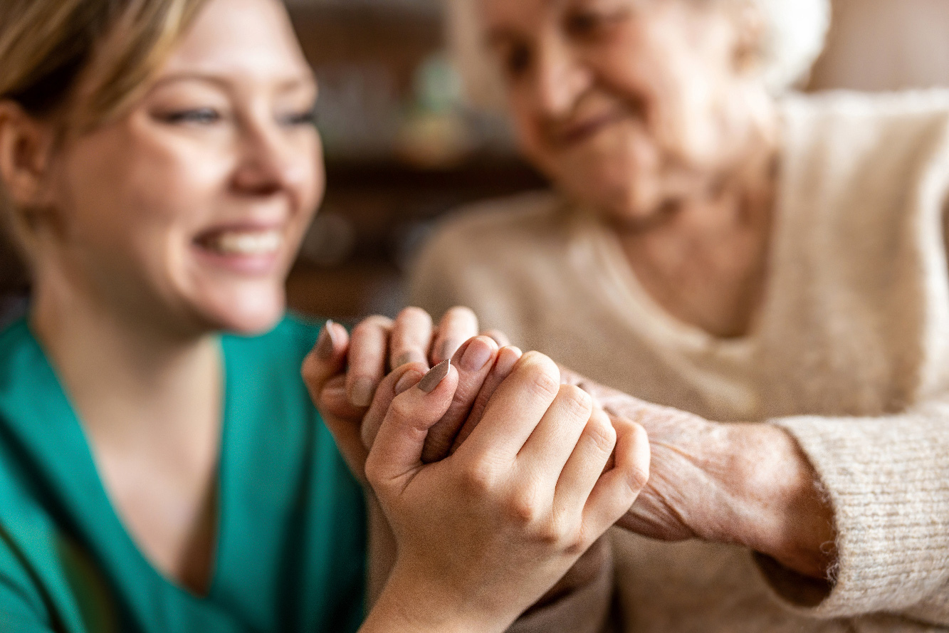 A caregiver with a dementia patient for Mari de Villa dementia care near me.
